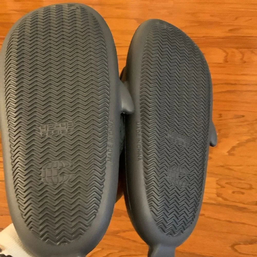 Shark furry (one pair) house slippers.  I have three Size 36-37